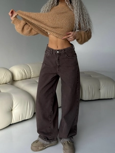 Jeans a zampa a vita bassa marrone vintage da donna con taglio slim e gamba larga lunga