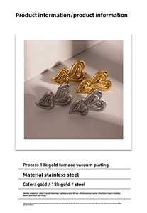 Detail view of 18K gold plated stainless steel heart earrings with liquid hammer texture