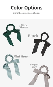 Detail view of 100% silk bow hair scrunchies in dark green, black, mint, and grey