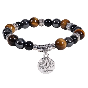 Détail de perles en jaspe zébré rose et oeil de tigre avec pendentif arbre de vie argent