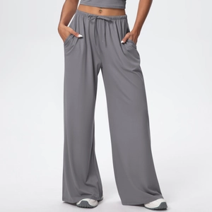 Close-up of grey lounge pants featuring adjustable drawstring waist and side pockets