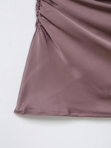Detail of purple satin fabric with ruched texture and high-quality hem stitching