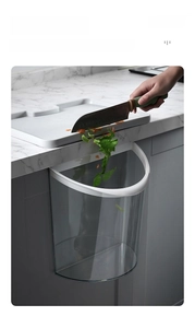 Kitchen hanging trash can with large opening for easy food waste disposal from cutting board
