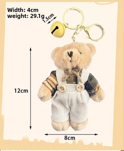 Detail view of plush bear keychain in plaid shirt with size 4cm and weight 29.1g specs