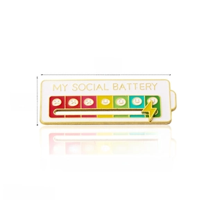 Detail shot of the social battery enamel pin showing exact dimensions 6.0cm and 2.5cm size