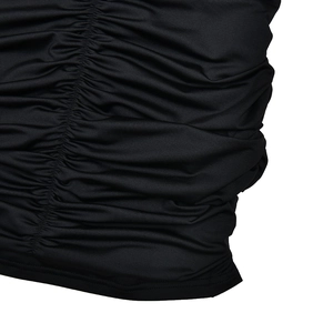 Detailed close-up showing the side ruching and pleated texture on a black bodycon dress
