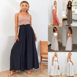 Détails d'un pantalon large taille haute avec cordon de serrage et tissu en coton décontracté