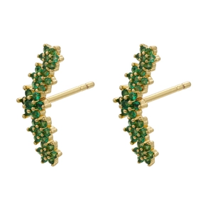 Macro view of gold-plated stud earrings featuring emerald green cubic zirconia flower clusters