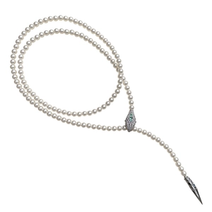 Elegant pearl necklace with a shimmering snake head pendant featuring green eyes