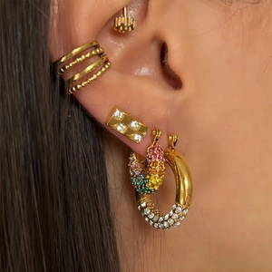 18K gold plated stainless steel hoop earrings set with colorful zircon stones on ear