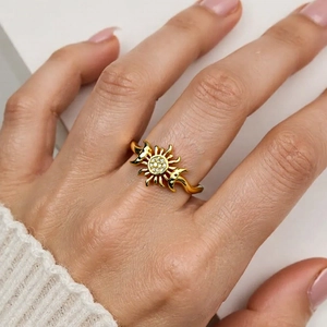 18K gold plated sun and moon open ring with sparkling cubic zirconia on a hand