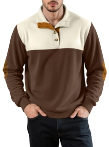 Detail of men's polo shirt featuring brown and yellow color-block design and elbow patches