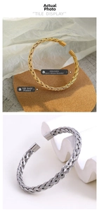 Detailed close-up of 18K gold plated braided twisted open bangle for men and women