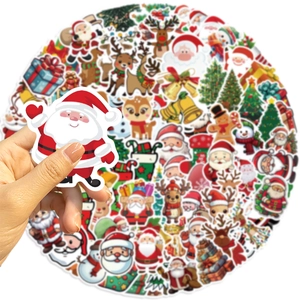 Close-up of hand holding a waterproof Santa Claus sticker from a 100-piece festive set