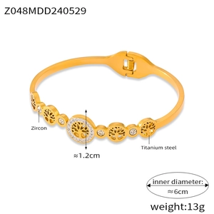 Detail showing the Tree of Life titanium steel bracelet with diameter and weight specs