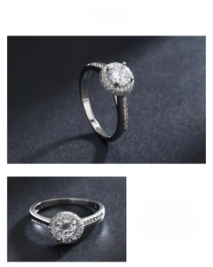Detailed close-up showing S925 sterling silver halo ring with a round center stone