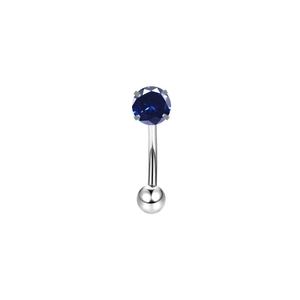 Detail of curved stainless steel eyebrow ring featuring a round blue zircon gemstone