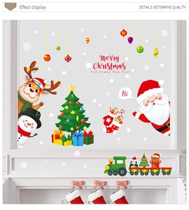 Cozy living room setting featuring festive Christmas wall decals above a fireplace mantel