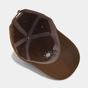 Dark brown baseball cap with sun embroidery and adjustable metal buckle strap