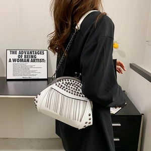 White rivet shell bag with silver fringe chain and punk style crossbody strap