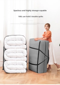 Detailed view of a 180L grey Oxford cloth storage bag holding three double quilts