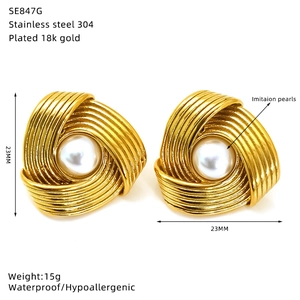 Detail shot of vintage ruffle pearl stud earrings with size and material specifications