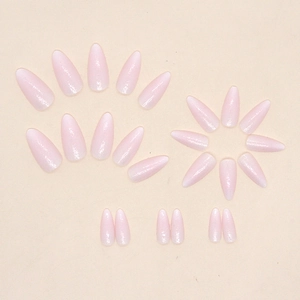 Almond shaped light pink press-on nails with fine silver glitter finish in set