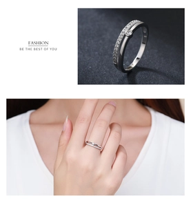 Detail of layered s925 silver ring with micro-pave zircons and model wearing view