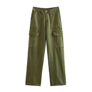 Detail of army green cargo pants showing durable cotton twill fabric and side flap pockets