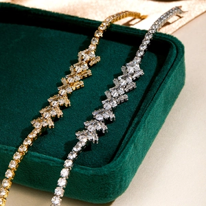Detail of luxury irregular tennis bracelets with cubic zirconia on velvet jewelry box