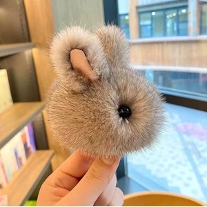 Cute brownish-grey plush rabbit head pendant keychain with soft faux fur and long ears