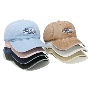 Vintage washed cotton baseball caps with 'You're worthy of that love' embroidery in multi-colors