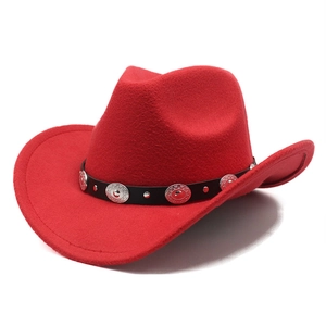Detailed view of red felt cowboy hat with black leather band and silver metal rivets
