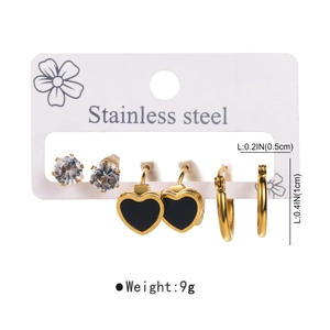 Detail view of 3-pair stainless steel earring set with heart motifs and zircon studs