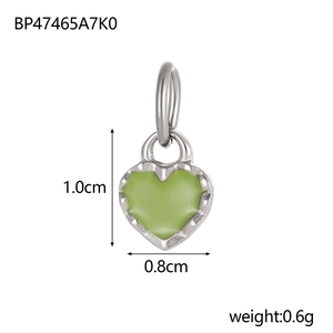 Detail showing 1.0cm by 0.8cm silver heart pendant with light green enamel inlay