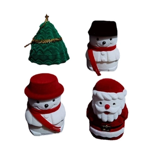 Velvet Christmas jewelry boxes featuring Santa, snowman, and tree designs for rings