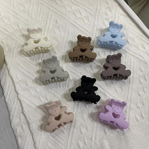 Cute macaron color bear hair claws in eight matte finishes with hollow heart detail