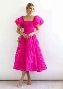 Detail of rose pink plaid dress with puff sleeves and ruched off-shoulder bodice
