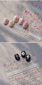 Close-up of 3D embossed bow and lace nail stickers with golden bronzing details