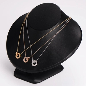 Minimalist double interlocking ring necklace with crystals in gold, silver, and rose gold