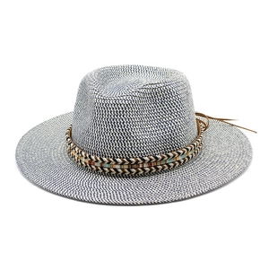 Ethnic straw hat with navy weave and colorful tribal band for sun protection