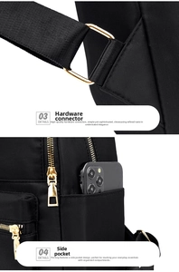 Close-up of black oxford backpack showing side pocket with smartphone and gold metal clips