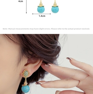 Detailed size specifications and model view of turquoise drop earrings with gold mesh details