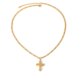Macro detail of golden cross necklace with square zircons and Figaro chain link