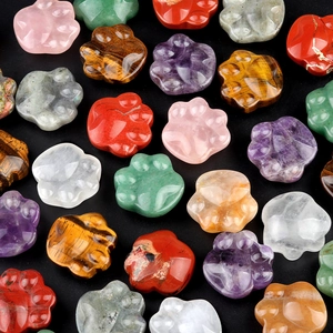 Carved natural crystal cat paw ornaments in amethyst pink and tiger eye stone