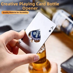 Action shot of an Ace of Spades stainless steel card bottle opener opening a beer bottle