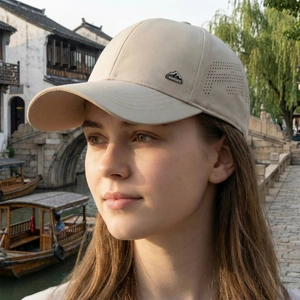 Summer mesh baseball cap in beige with breathable laser-cut holes and sun protection