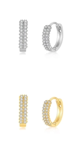Detailed view of dual-row zircon huggie earrings in silver and gold polished finish