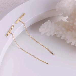 Minimalist 18k gold plated stainless steel long bar threader earrings on coral stand