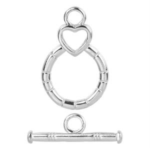 Macro shot of polished silver heart-shaped toggle clasp and T-bar jewelry connector